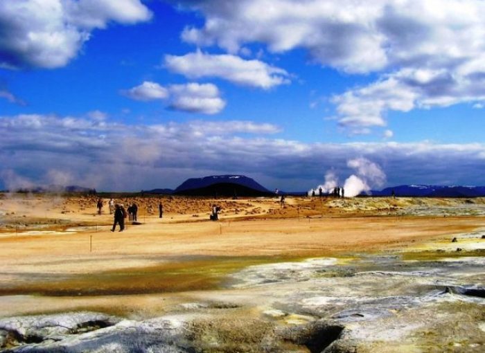 steam rising up from colourful ground mud pits at Lake Myvatn