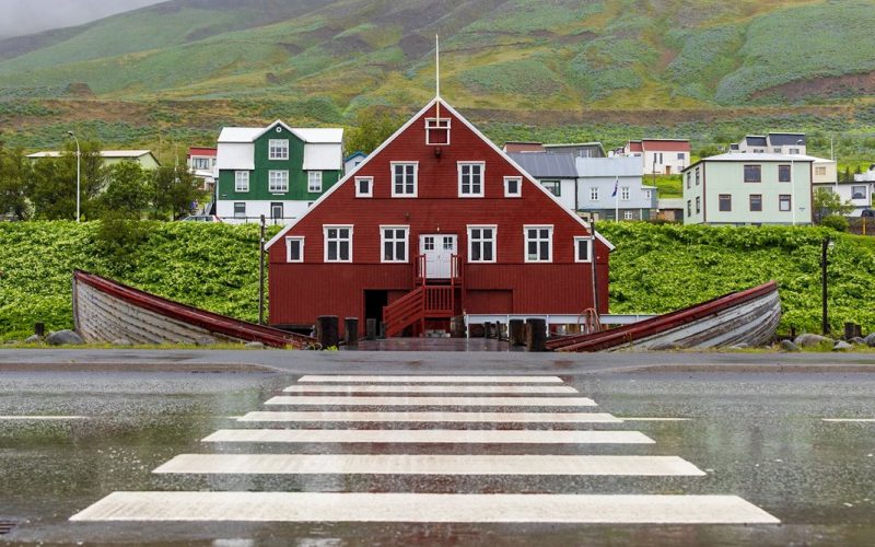 Red house in Siglufjordur Sigló Arctic Coastline ouside from Akureyri herring museum