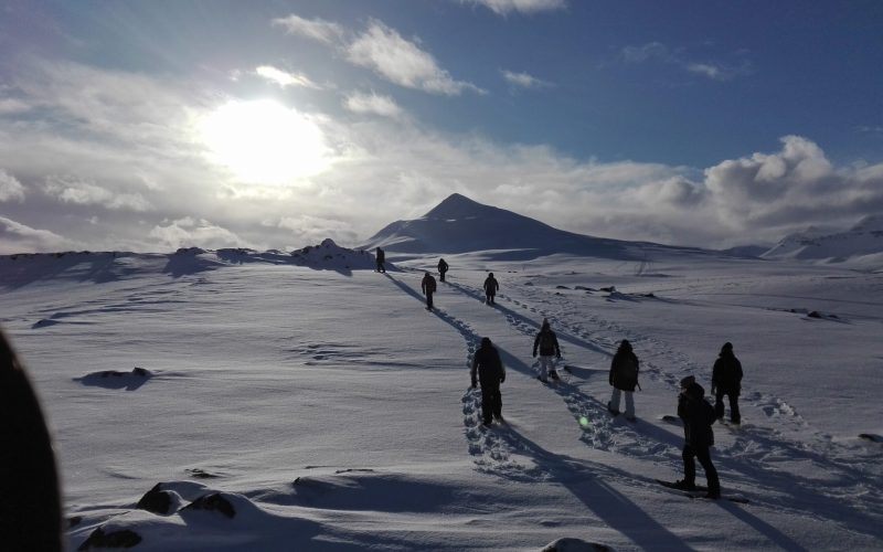 Snowshoeing Akureyri walking in frost on a mountain in snow shoes